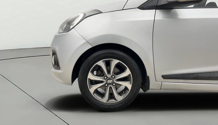 2014 Hyundai Xcent SX 1.2 (O), Petrol, Manual, 1,02,924 km, Left Front Wheel