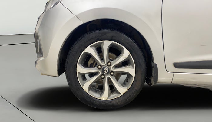2014 Hyundai Xcent SX AT 1.2 (O), Petrol, Automatic, 1,09,489 km, Left Front Wheel