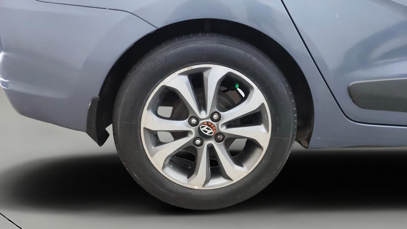 2014 Hyundai Xcent SX 1.2 (O), Petrol, Manual, 1,20,866 km, Right Rear Wheel
