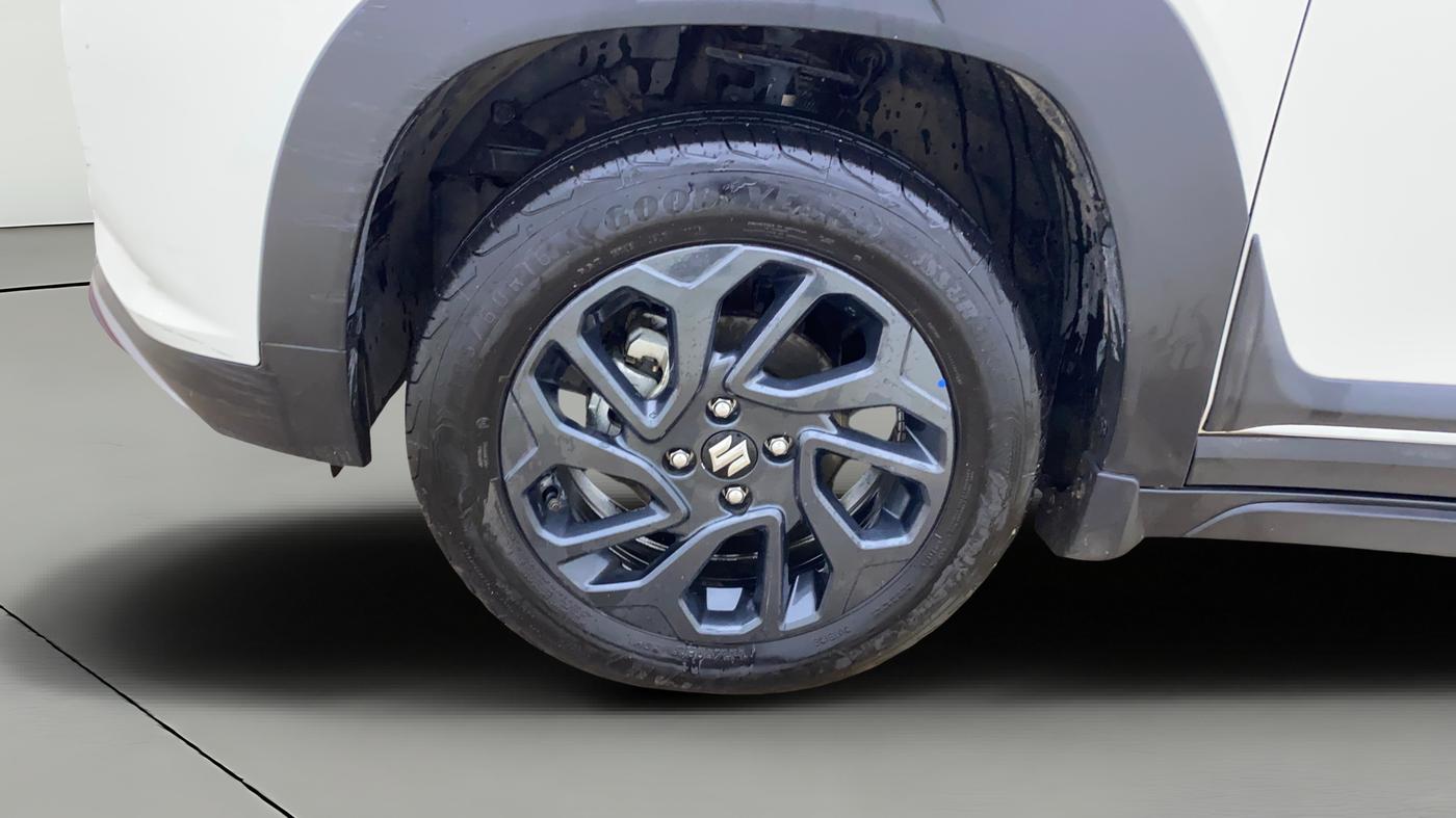 2025 Maruti FRONX DELTA PLUS 1.2L AGS, Petrol, Automatic, 9,784 km, Left Front Wheel