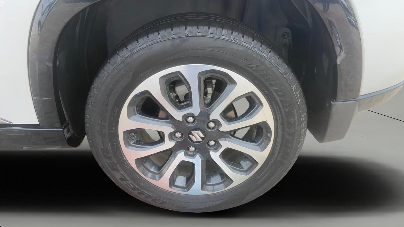 2023 Maruti Grand Vitara ALPHA PLUS HYBRID ECVT, Hybrid, Automatic, 1,08,734 km, Left Rear Wheel
