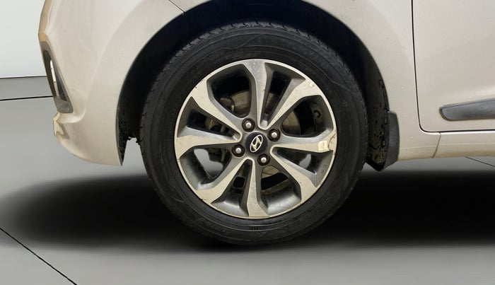 2015 Hyundai Xcent SX AT 1.2 (O), Petrol, Automatic, 1,37,994 km, Left Front Wheel