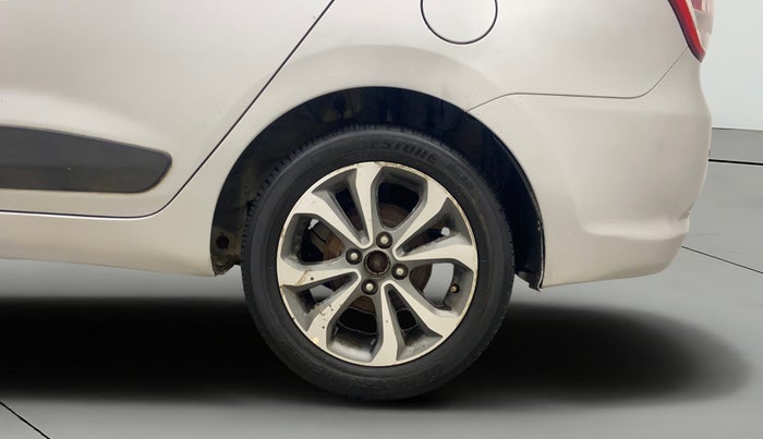2014 Hyundai Xcent SX AT 1.2 (O), Petrol, Automatic, 1,09,489 km, Left Rear Wheel