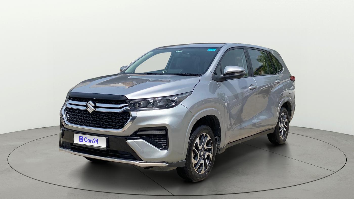 2023 Maruti Invicto ZETA PLUS 8 STR STRONG HYBRID, Hybrid, Automatic, 17,305 km, Left Front Diagonal