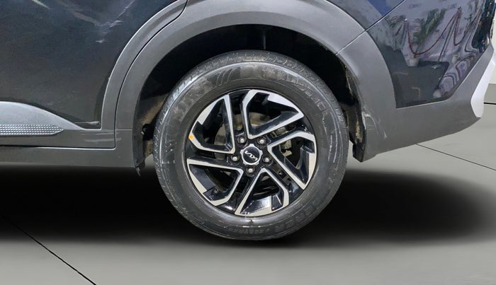 2023 KIA CARENS PRESTIGE PLUS 1.5 PETROL DCT 7 STR, Petrol, Automatic, 12,078 km, Left Rear Wheel