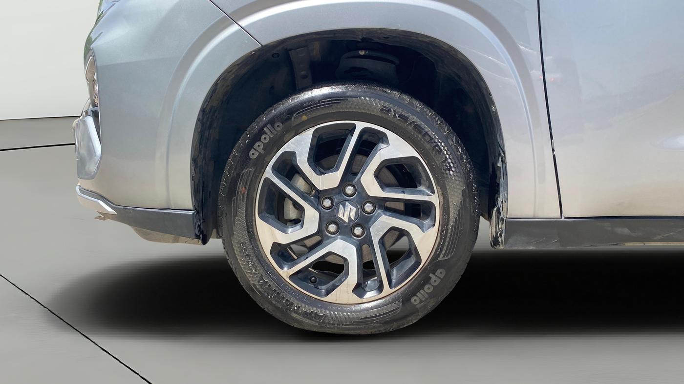 2023 Maruti Invicto ZETA PLUS 8 STR STRONG HYBRID, Hybrid, Automatic, 17,305 km, Left Front Wheel