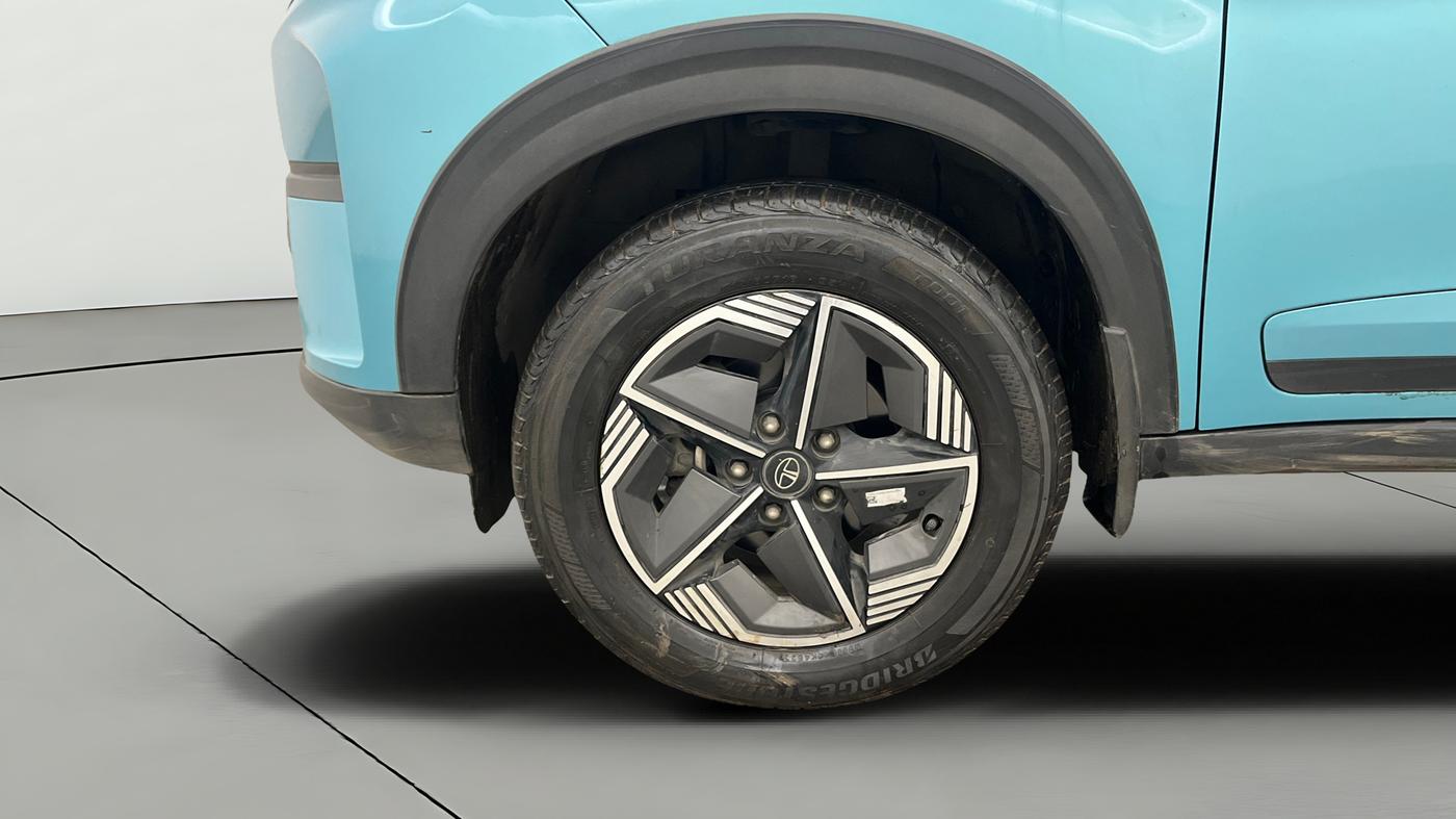 2023 Tata NEXON CREATIVE  AMT 1.2 PETROL, Petrol, Automatic, 32,336 km, Left Front Wheel