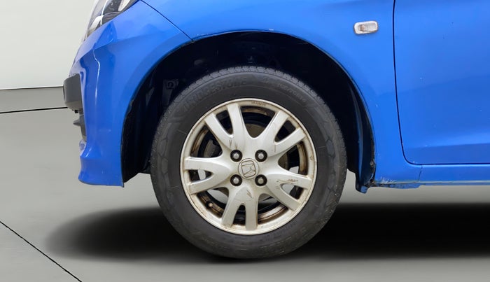 2013 Honda Brio V MT, Petrol, Manual, 1,19,328 km, Left Front Wheel