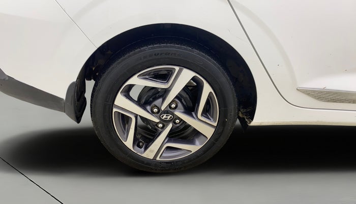 2022 Hyundai AURA SX 1.2 CNG, CNG, Manual, 1,22,124 km, Right Rear Wheel