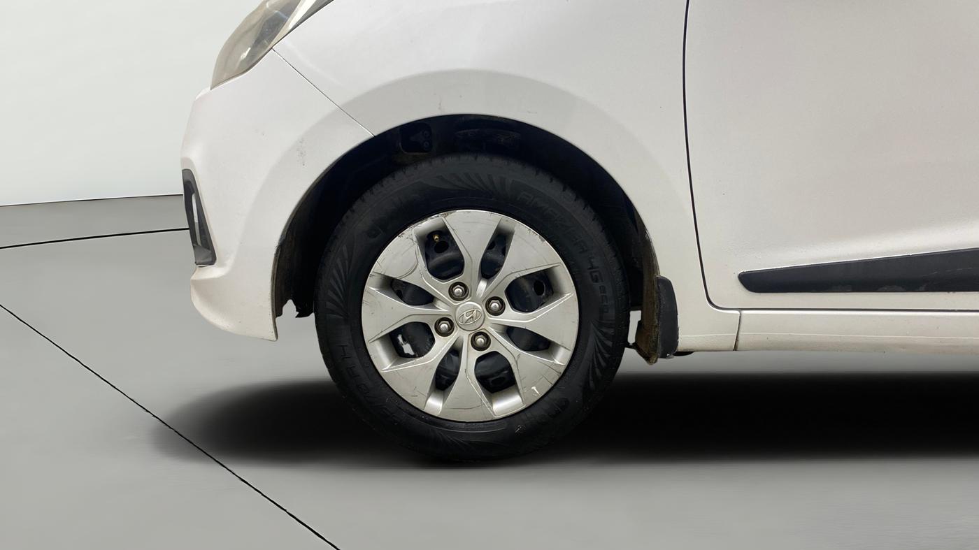 2014 Hyundai Xcent S 1.2, Petrol, Manual, 1,06,291 km, Left Front Wheel