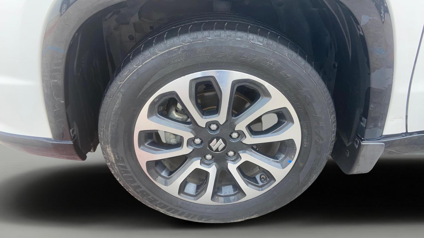 2023 Maruti Grand Vitara ALPHA PLUS HYBRID ECVT, Hybrid, Automatic, 1,08,734 km, Left Front Wheel