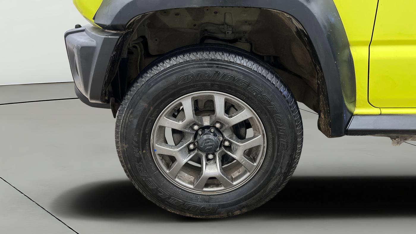 2023 Maruti JIMNY ALPHA ALL GRIP PRO AT DUAL TONE, Petrol, Automatic, 37,383 km, Left Front Wheel