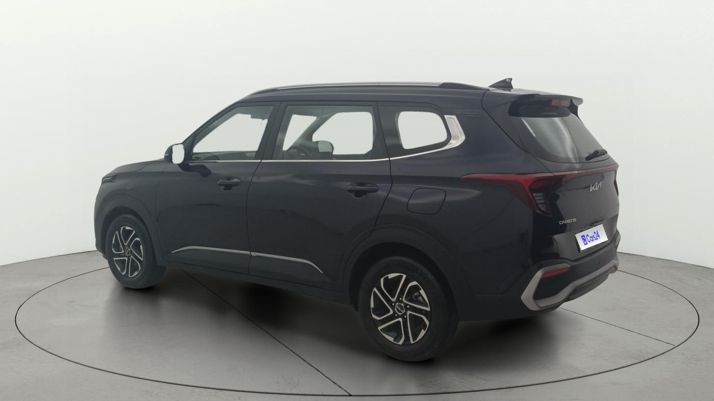 2023 KIA CARENS PRESTIGE PLUS 1.5 PETROL DCT 7 STR, Petrol, Automatic, 15,577 km, Left Back Diagonal