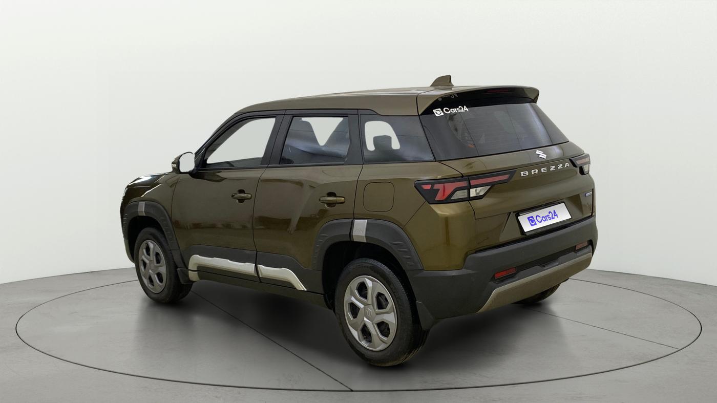 2024 Maruti BREZZA VXI AT SMART HYBRID, Petrol, Automatic, 27,089 km, Left Back Diagonal