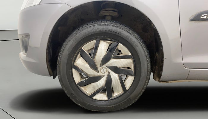 2013 Maruti Swift VXI, Petrol, Manual, 1,16,641 km, Left Front Wheel