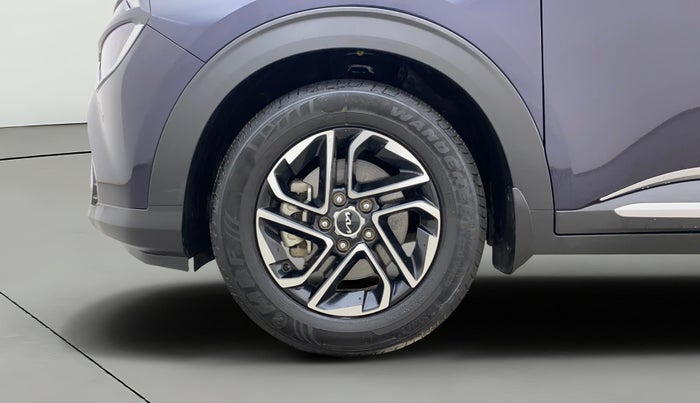 2023 KIA CARENS LUXURY PLUS 1.5 PETROL DCT 7 STR, Petrol, Automatic, 15,166 km, Left Front Wheel