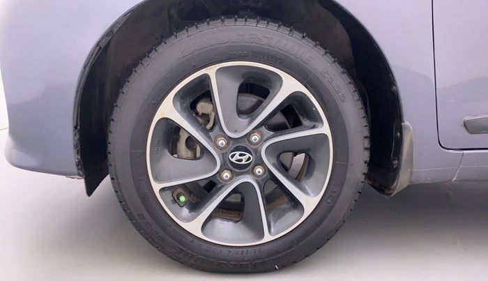 2017 Hyundai Grand i10 SPORTZ (O) 1.2 AT VTVT, Petrol, Automatic, 52,861 km, Left Front Wheel