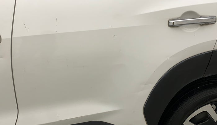 2022 Nissan MAGNITE XV PREMIUM TURBO CVT, Petrol, Automatic, 42,637 km, Rear left door - Slightly dented