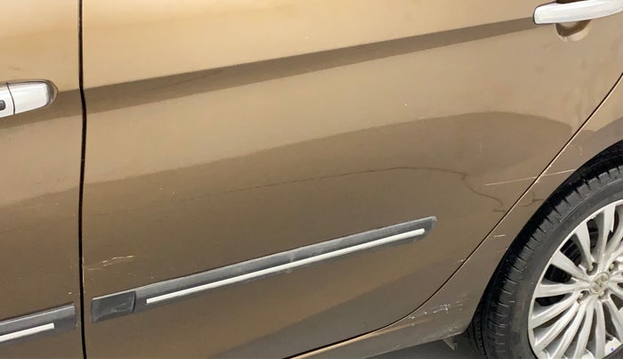 2016 Maruti Ciaz ZXI+ AT, Petrol, Automatic, 84,375 km, Rear left door - Minor scratches