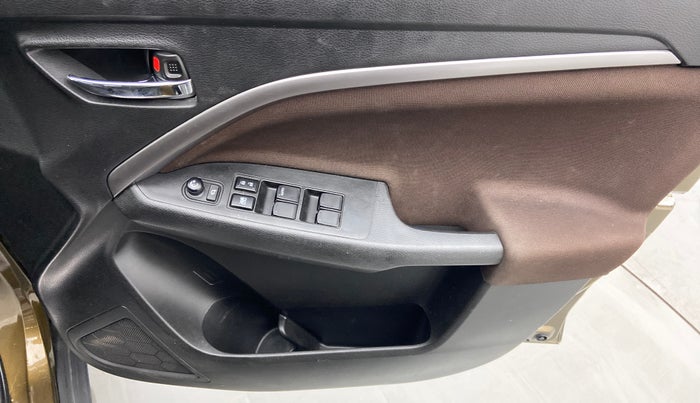 2022 Maruti BREZZA ZXI + AT SMART HYBRID DUAL TONE, Petrol, Automatic, 16,626 km, Driver Side Door Panels Control