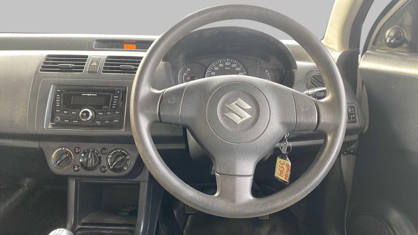 2012 Maruti Swift Dzire TOUR PETROL, Petrol, Manual, 16,581 km, Steering Wheel Close Up