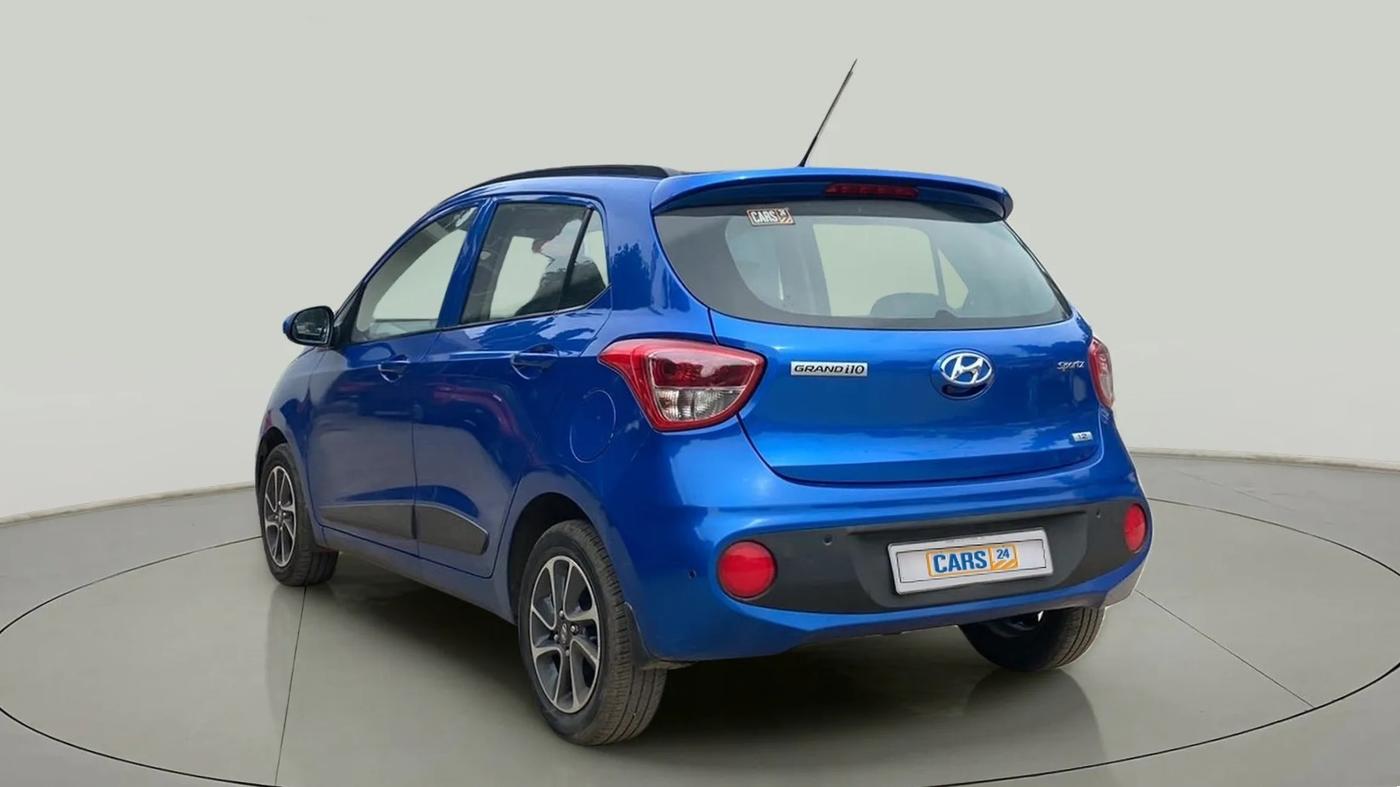 2019 Hyundai Grand i10 SPORTZ AT 1.2 KAPPA VTVT, Petrol, Automatic, 25,295 km, Left Back Diagonal