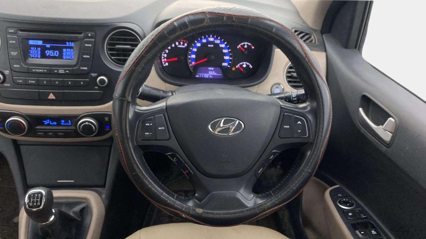 2014 Hyundai Xcent SX 1.2 (O), Petrol, Manual, 1,12,564 km, Steering Wheel Close Up