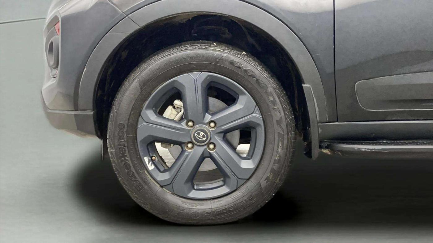2023 Tata NEXON XZA PLUS LUX SUNROOF RED DARK PETROL, Petrol, Automatic, 23,573 km, Left Front Wheel