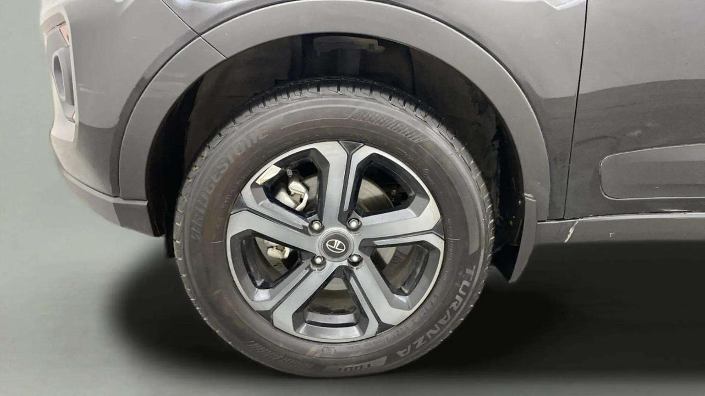 2023 Tata NEXON XZA PLUS LUX SUNROOF RED DARK PETROL, Petrol, Automatic, 9,454 km, Left Front Wheel
