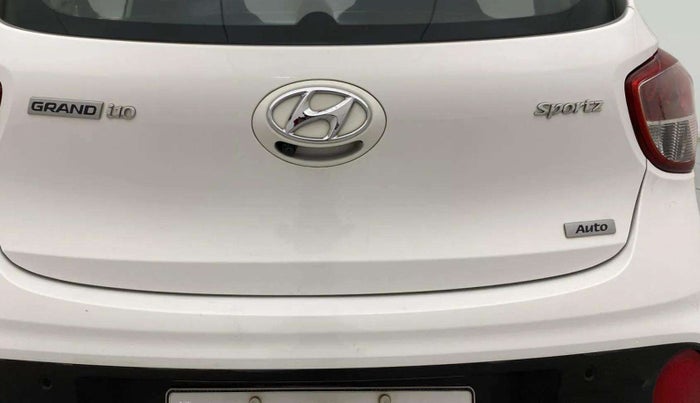 2017 Hyundai Grand i10 SPORTZ (O) AT 1.2 KAPPA VTVT, CNG, Automatic, 32,603 km, Dicky (Boot door) - Handle has minor damage