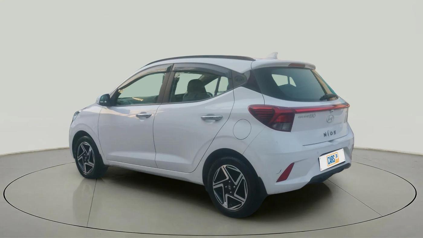 2024 Hyundai GRAND I10 NIOS ASTA AMT 1.2 KAPPA VTVT, Petrol, Automatic, 7,525 km, Left Back Diagonal