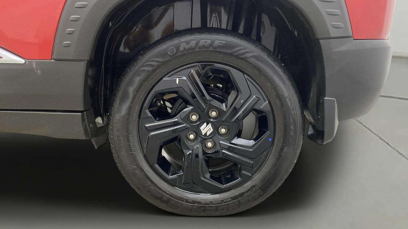 2023 Maruti BREZZA ZXI  AT SMART HYBRID DUAL TONE, Petrol, Automatic, 30,934 km, Left Rear Wheel