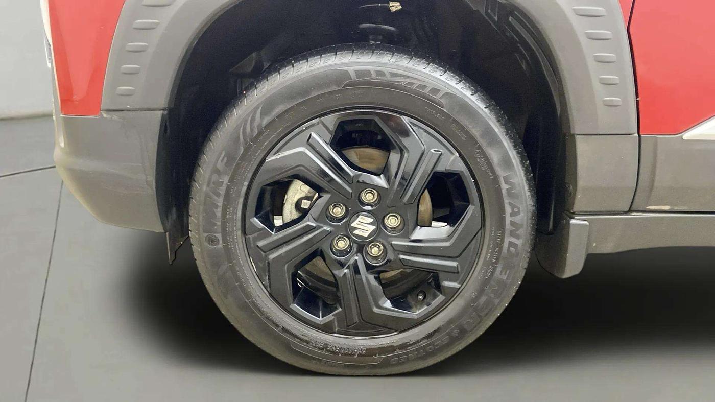 2023 Maruti BREZZA ZXI  AT SMART HYBRID DUAL TONE, Petrol, Automatic, 30,934 km, Left Front Wheel