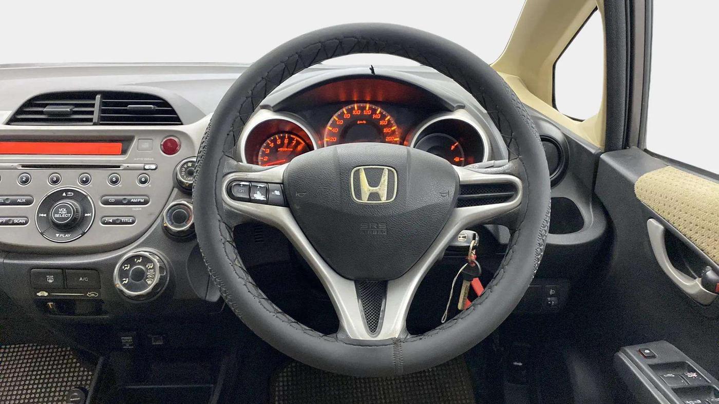 2012 Honda Jazz 1.2 L I-VTEC SELECT, Petrol, Manual, 1,08,222 km, Steering Wheel Close Up