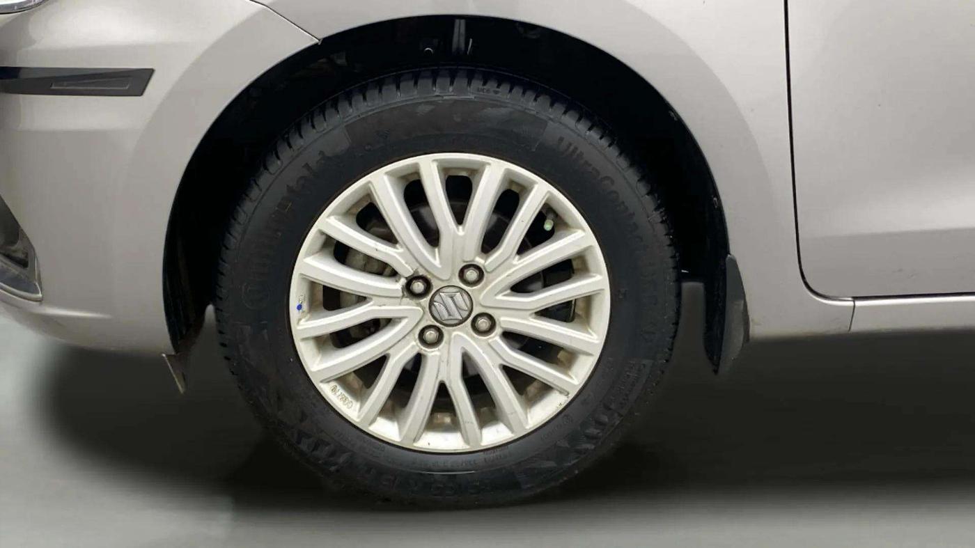 2021 Maruti Dzire ZXI AMT, Petrol, Automatic, 1,24,064 km, Left Front Wheel