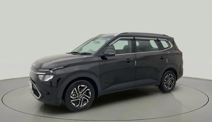 2023 KIA CARENS PRESTIGE PLUS 1.5 PETROL DCT 7 STR, Petrol, Automatic, 27,100 km, Left Front Diagonal