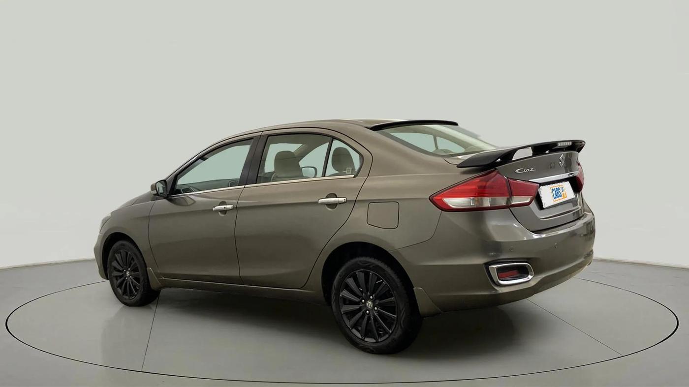 2021 Maruti Ciaz ALPHA  AT 1.5 SHVS PETROL, Petrol, Automatic, 83,015 km, Left Back Diagonal