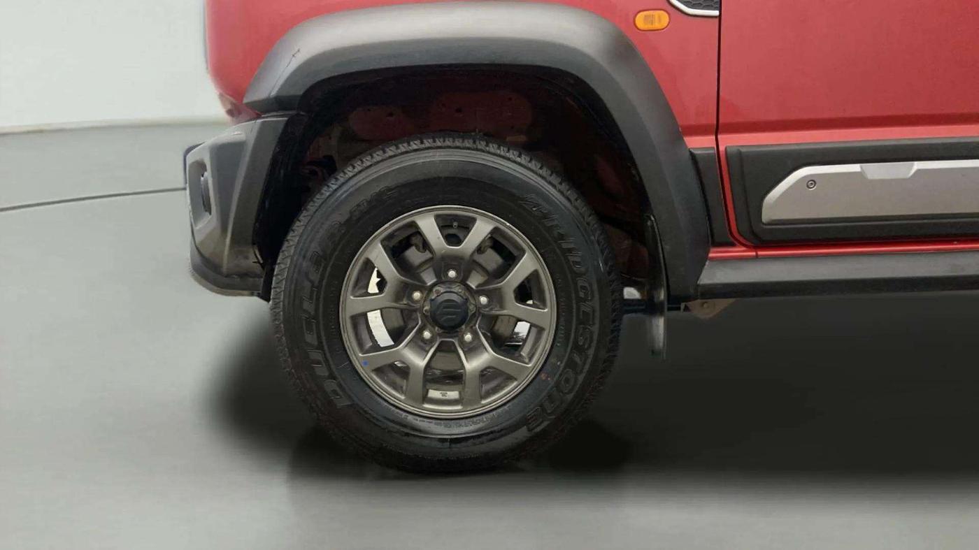 2023 Maruti JIMNY ALPHA ALL GRIP PRO MT DUAL TONE, CNG, Manual, 32,729 km, Left Front Wheel