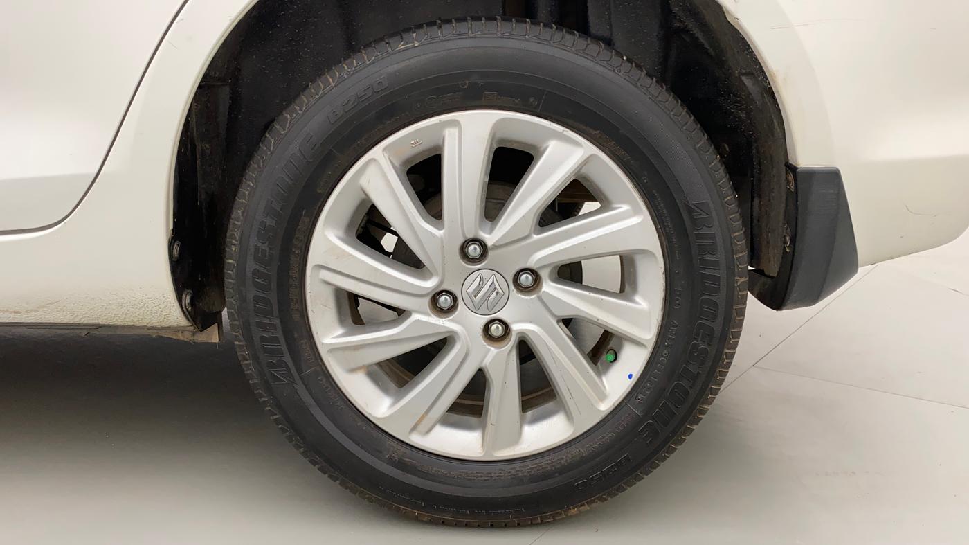 2015 Maruti Swift Dzire ZXI, Petrol, Manual, 1,43,094 km, Left Rear Wheel