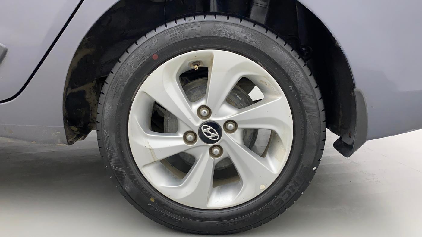 2017 Hyundai Xcent SX 1.2, Petrol, Manual, 1,10,011 km, Left Rear Wheel