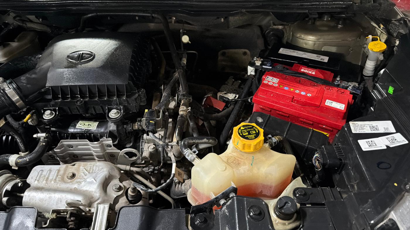 2023 Tata NEXON XZA PLUS LUX SUNROOF KAZIRANGA PETROL, Petrol, Automatic, 21,191 km, Engine View - Left