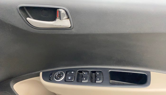 2014 Hyundai Xcent SX AT 1.2 (O), Petrol, Automatic, 1,09,489 km, Driver Side Door Panels Control