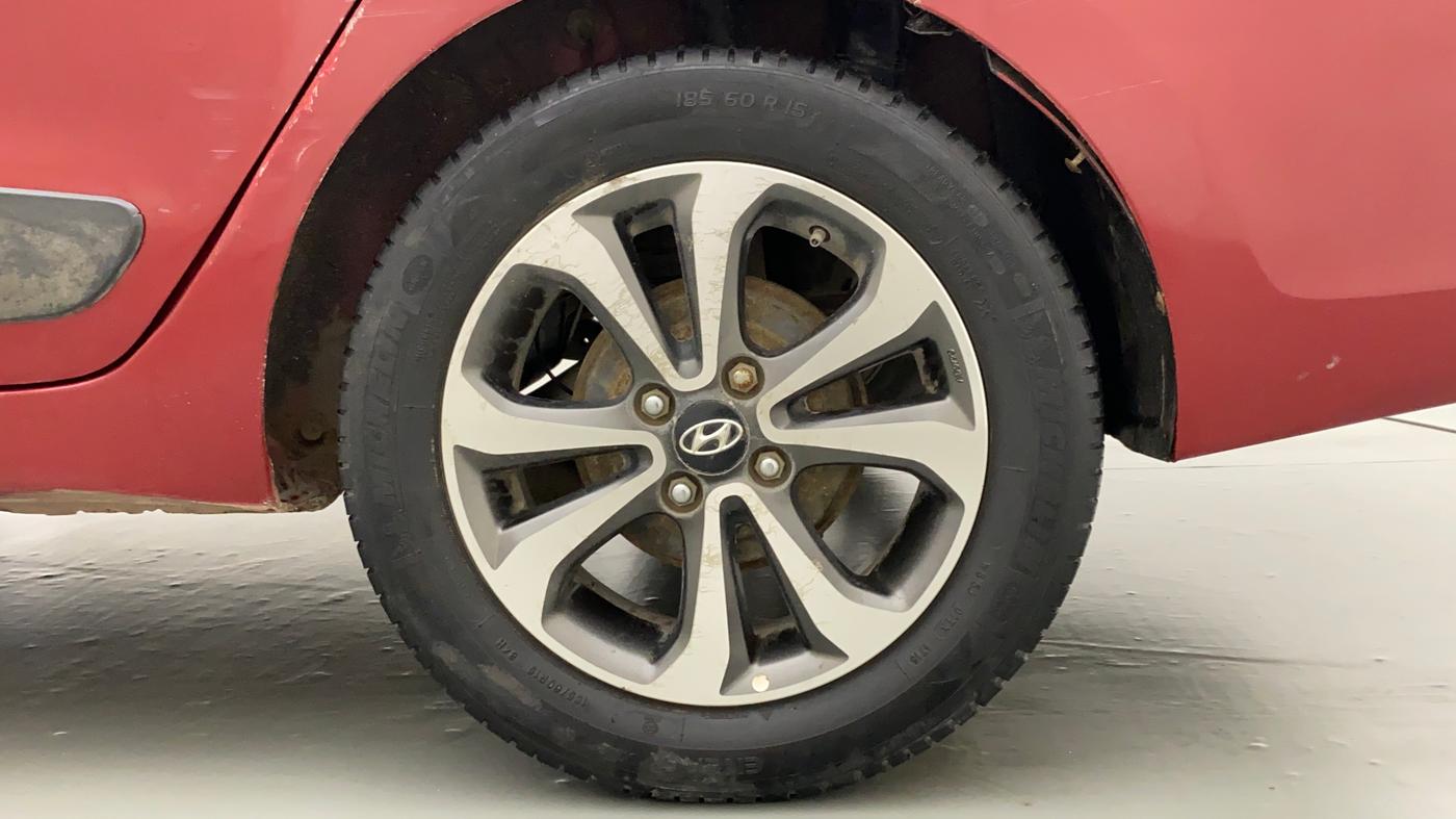 2014 Hyundai Xcent SX 1.2, Petrol, Manual, 1,09,004 km, Left Rear Wheel