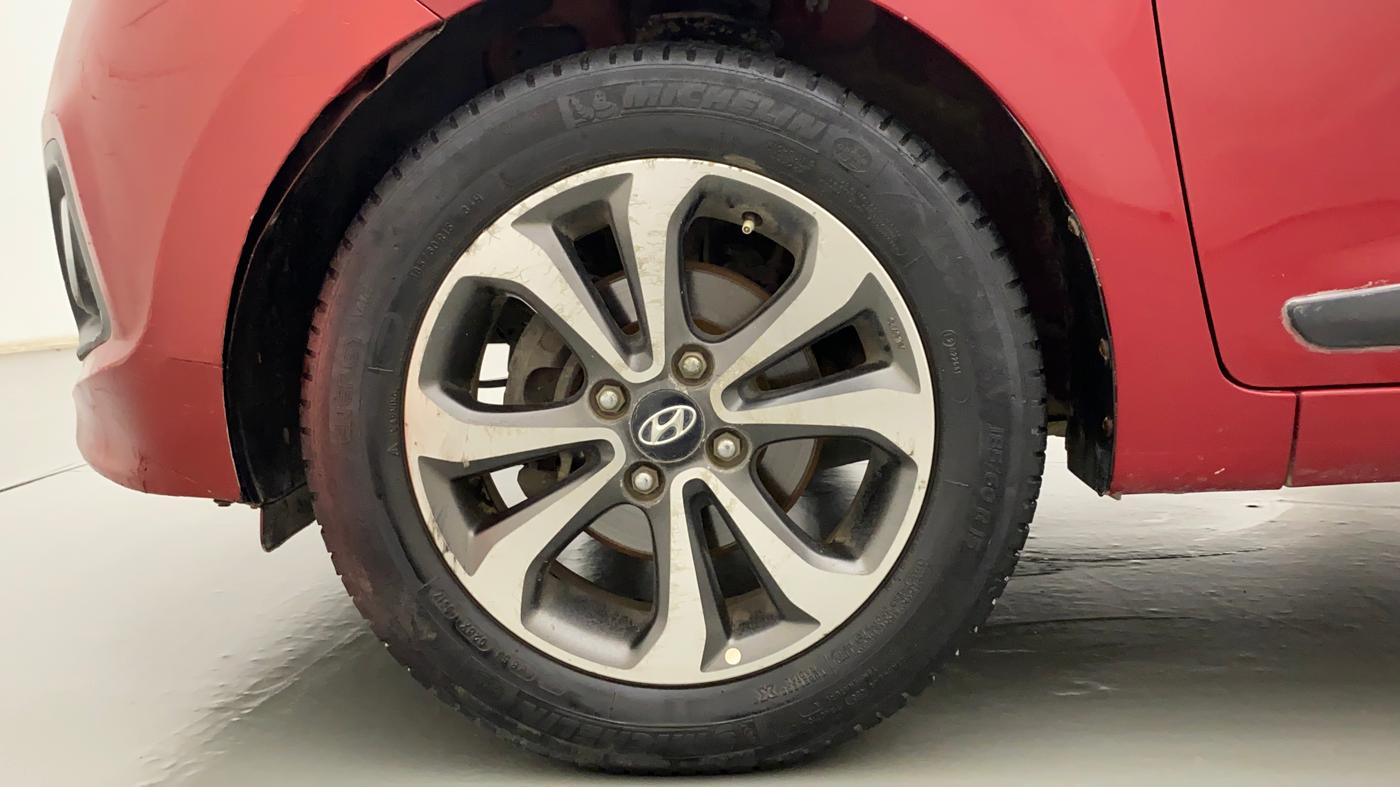 2014 Hyundai Xcent SX 1.2, Petrol, Manual, 1,09,004 km, Left Front Wheel