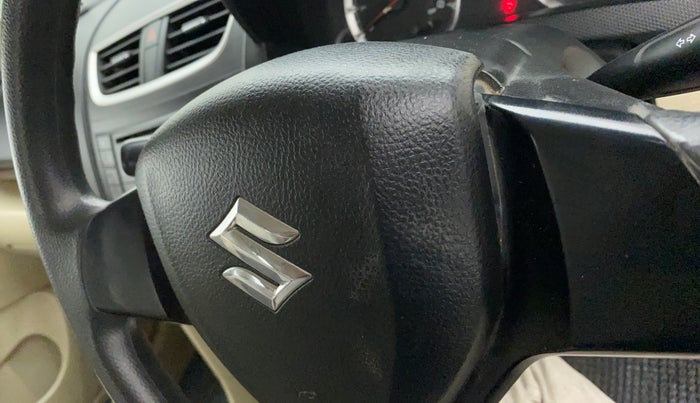 2012 Maruti Swift Dzire VXI, Petrol, Manual, 79,303 km, Steering wheel - Horn pad has minor damage