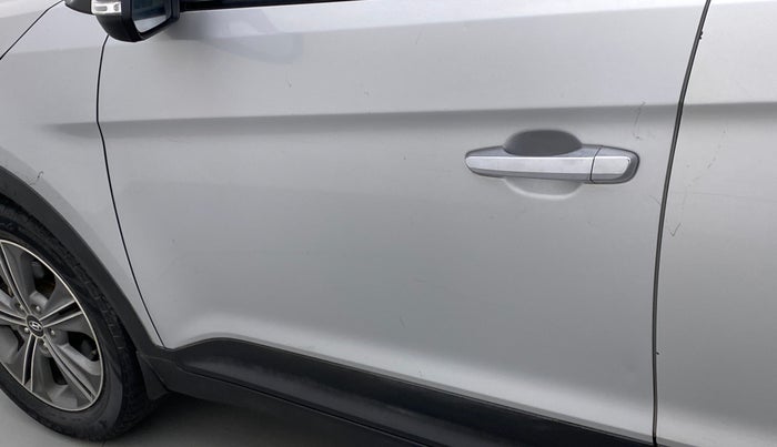 2016 Hyundai Creta SX PLUS AT 1.6 DIESEL, Diesel, Automatic, 1,02,096 km, Front passenger door - Minor scratches