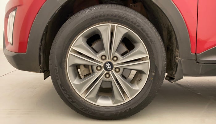 2018 Hyundai Creta SX PLUS AT 1.6 PETROL, Petrol, Automatic, 1,41,980 km, Left Front Wheel