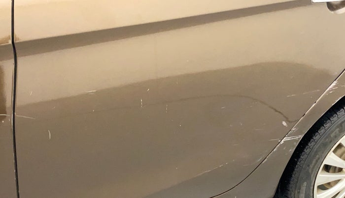 2015 Maruti Ciaz ZXI, Petrol, Manual, 51,093 km, Rear left door - Minor scratches